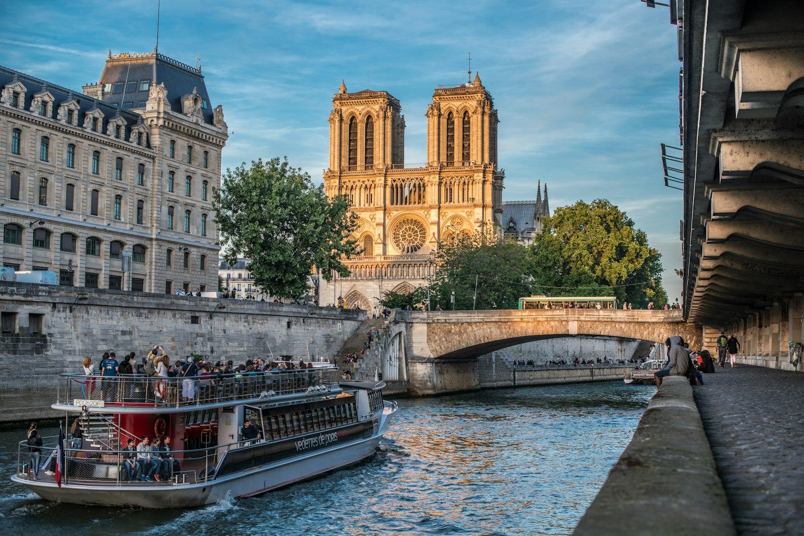 A Boat On A River With Buildings On Either Side Of jigsaw puzzle preview
