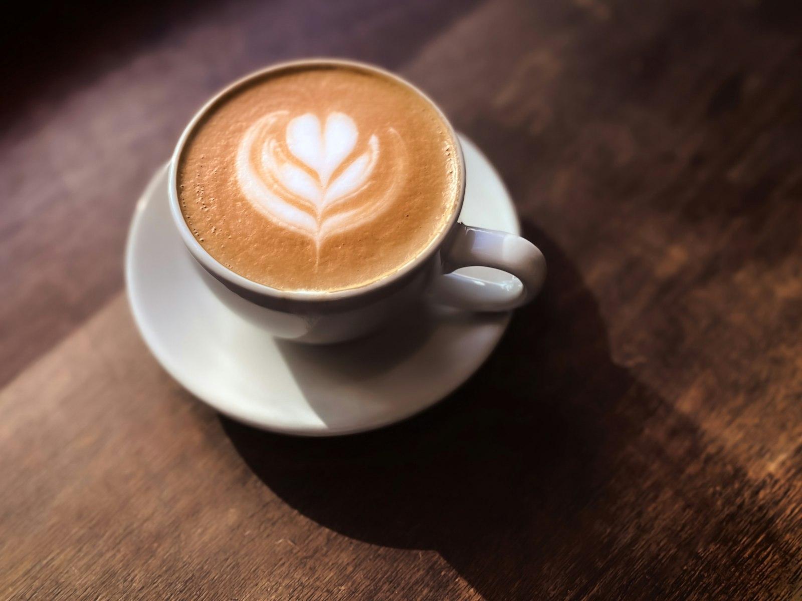 A Cappuccino On A Saucer On A Wooden Table jigsaw puzzle preview