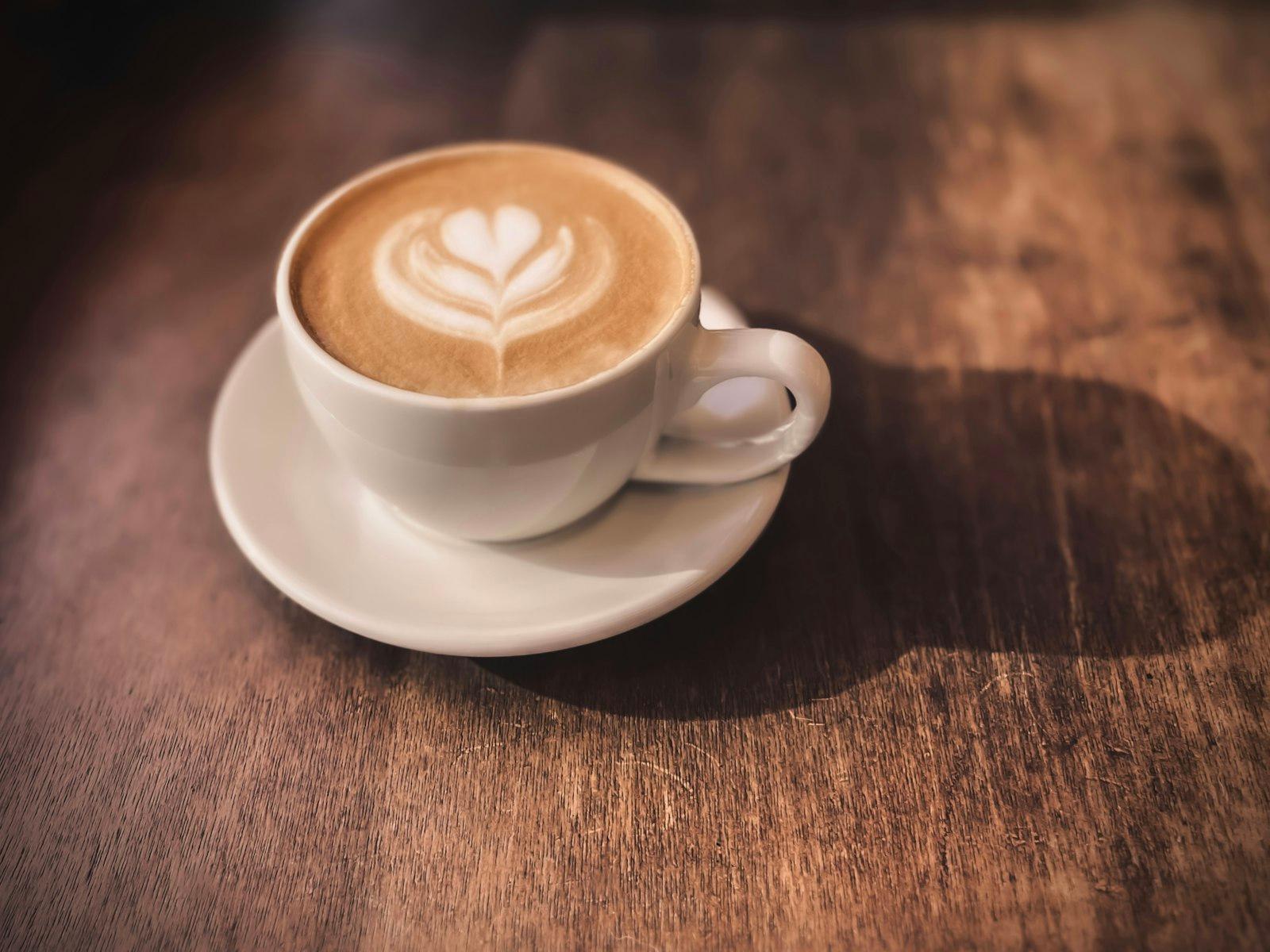 A Cappuccino On A Saucer On A Wooden Table jigsaw puzzle preview
