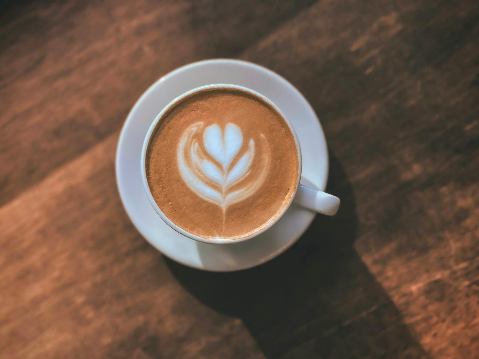 A Cappuccino On A Saucer On A Wooden Table jigsaw puzzle preview