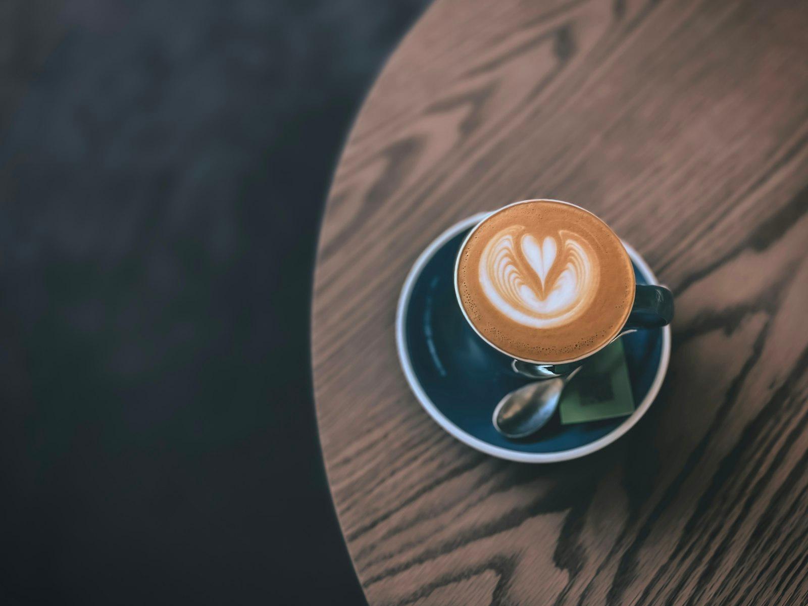 A Cappuccino On A Saucer On A Wooden Table jigsaw puzzle preview