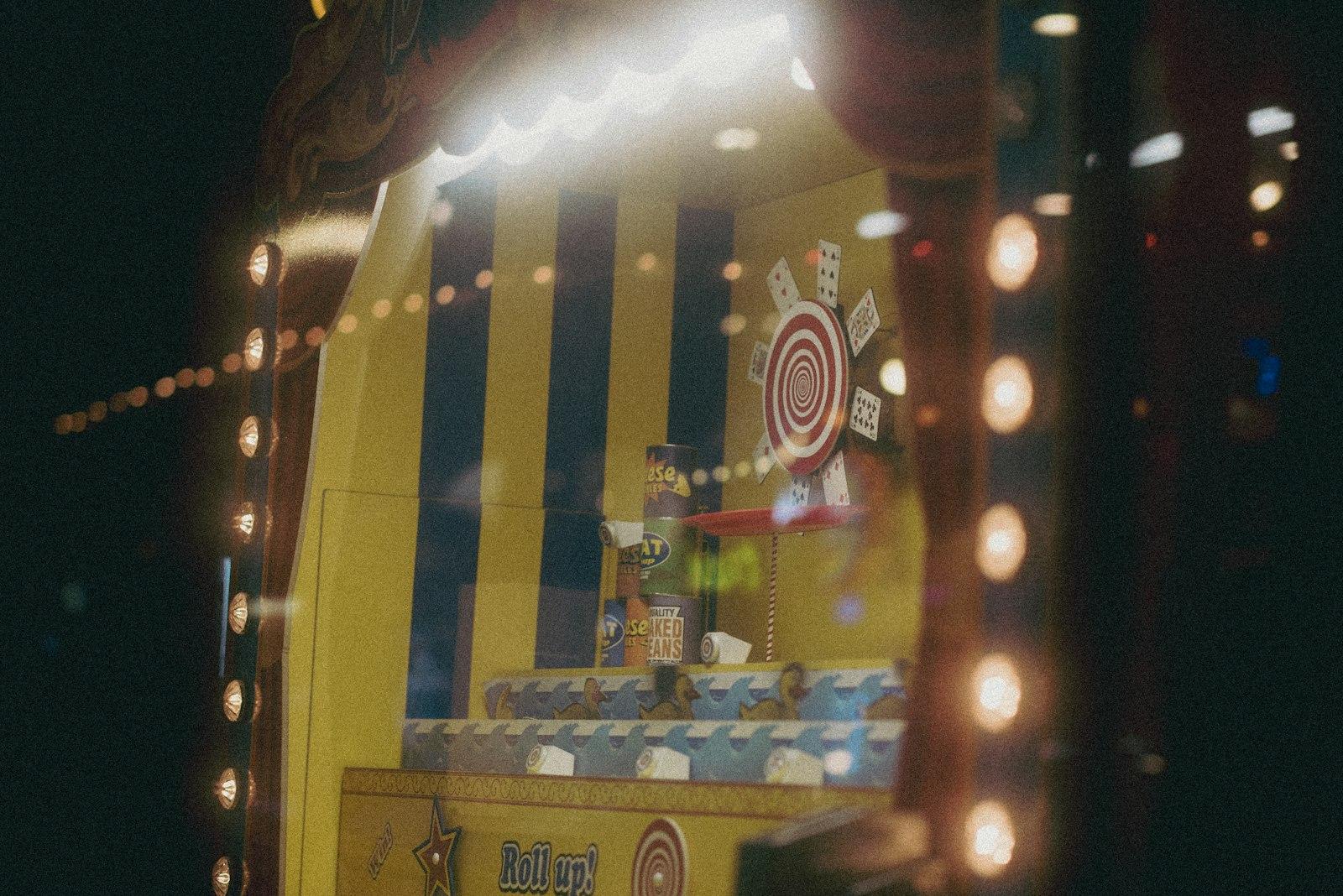 A Carnival Game Booth Is Lit Up At Night jigsaw puzzle preview