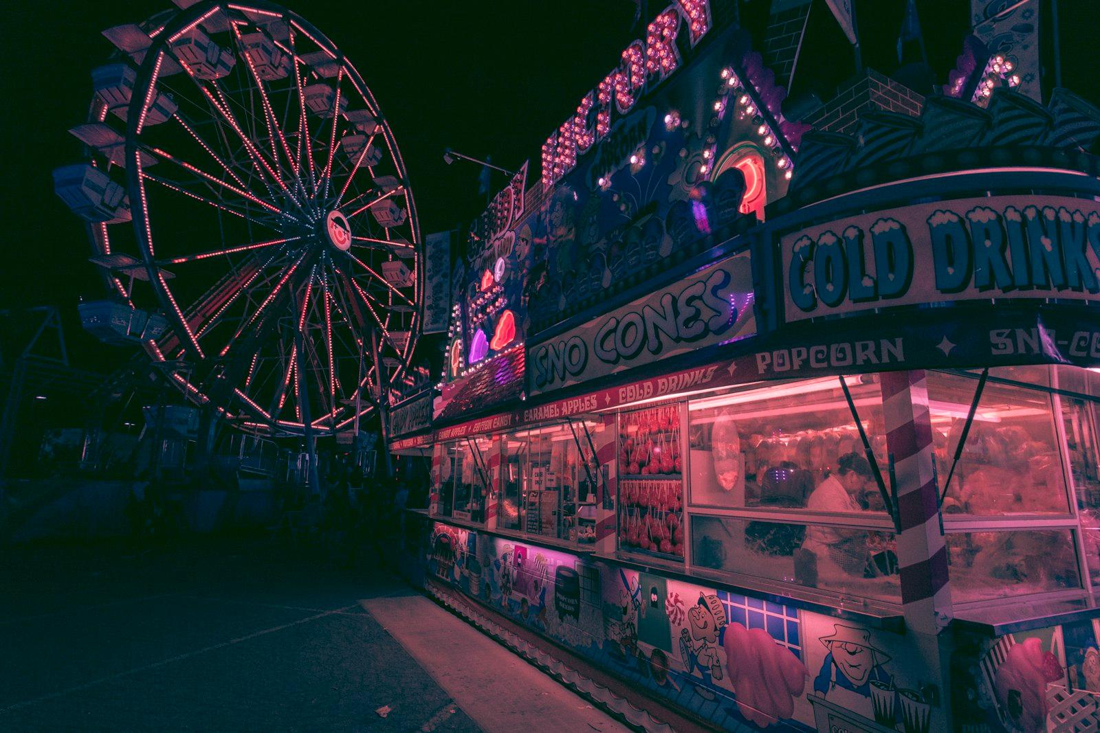 A Carnival With A Ferris Wheel In The Background jigsaw puzzle preview