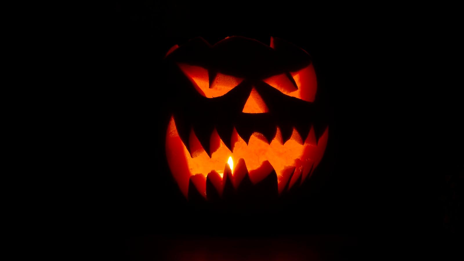 A Carved Pumpkin With A Light Inside jigsaw puzzle preview