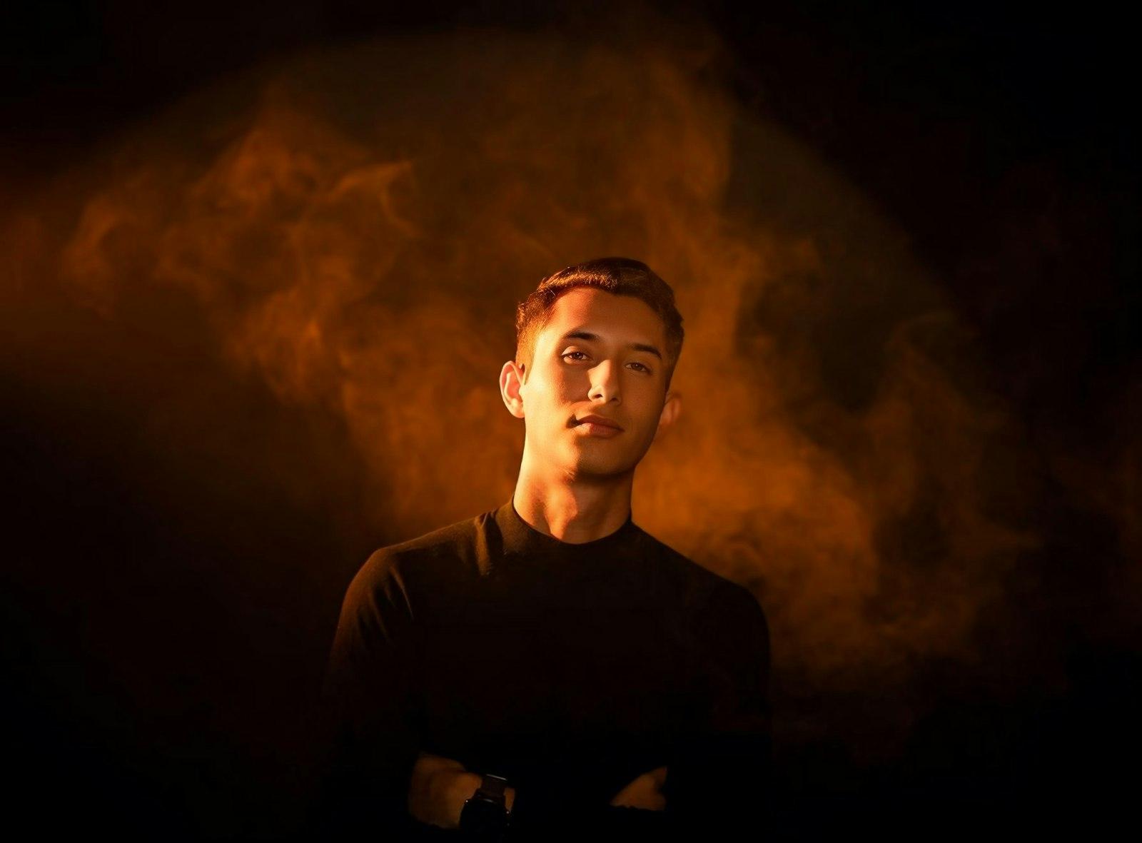 A Man Standing In Front Of A Dark Background jigsaw puzzle preview