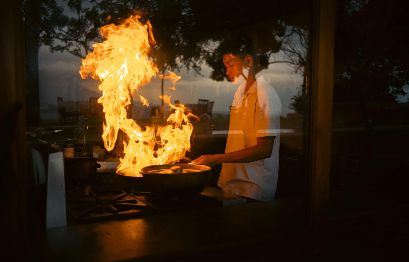 A Man Standing In Front Of A Fire Pit jigsaw puzzle preview