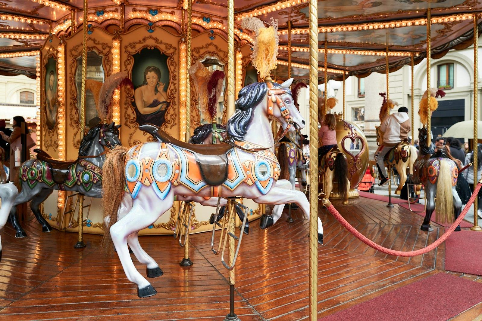A Merry Go Round With Horses On A Wooden Floor jigsaw puzzle preview