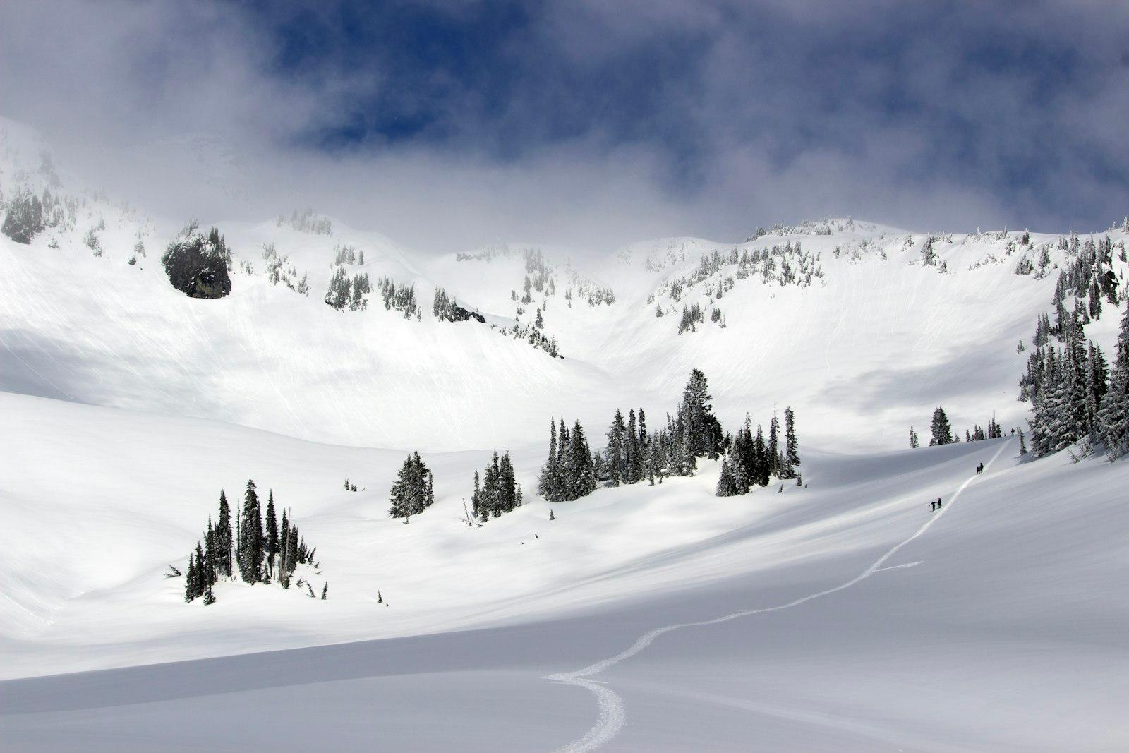 A Person Skiing Down A Snow Covered Mountain jigsaw puzzle preview