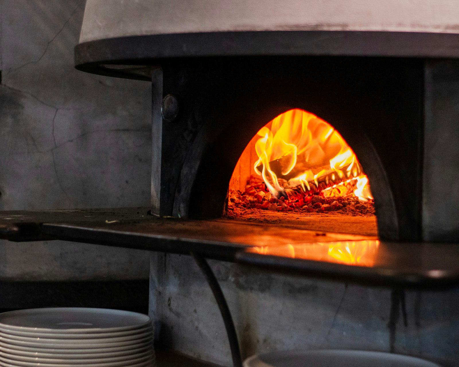 A Pizza Oven With A Pizza Inside Of It jigsaw puzzle preview