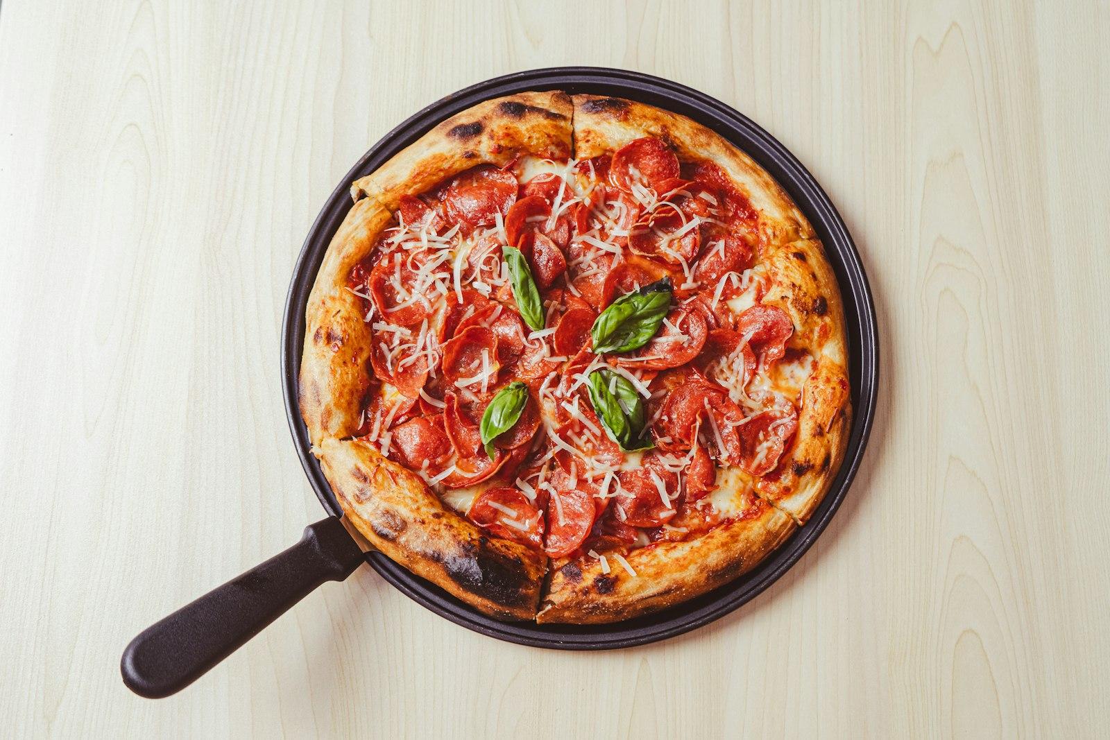 A Pizza Sitting On Top Of A Pan On A Table jigsaw puzzle preview