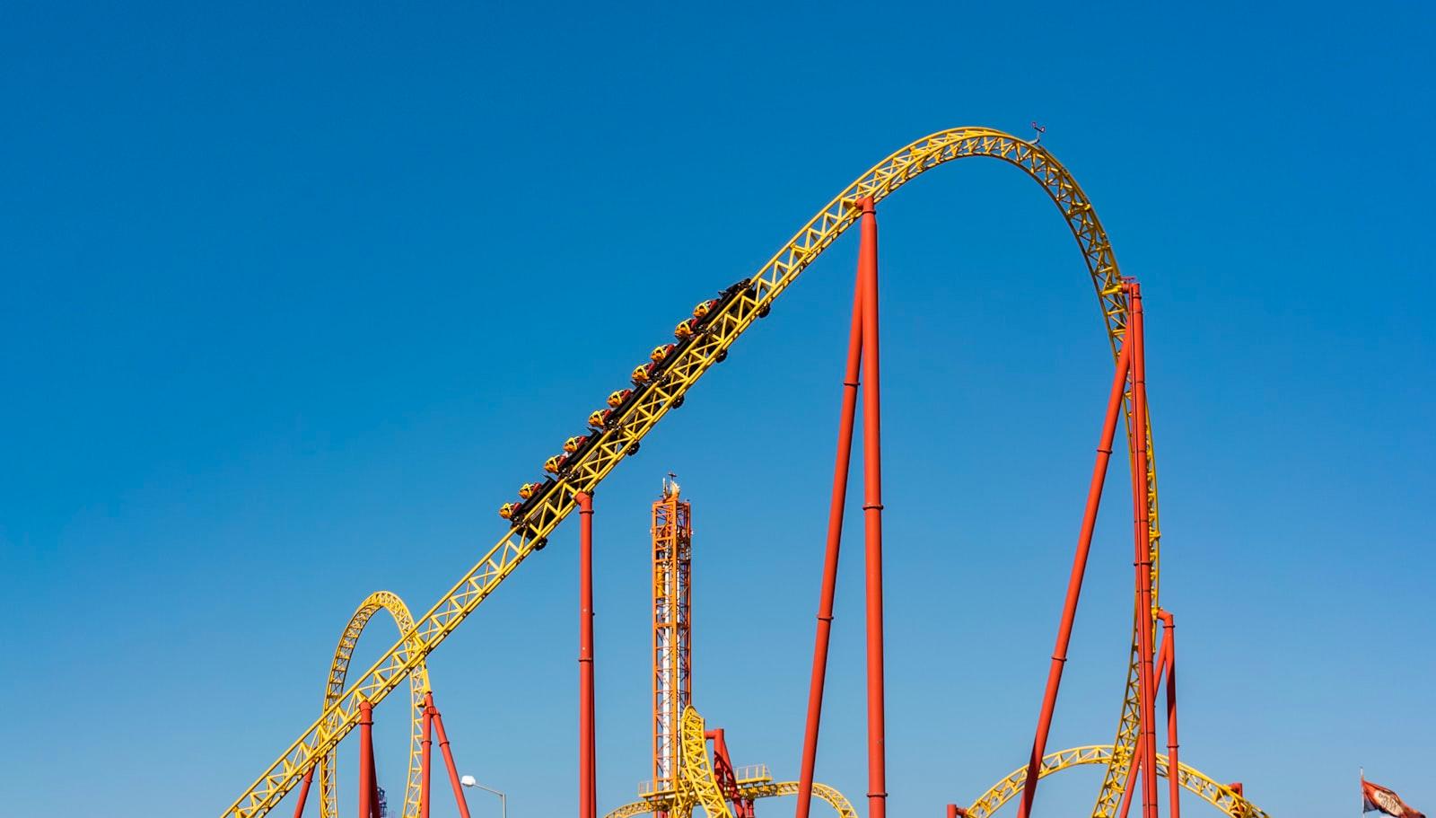 A Roller Coaster In An Amusement Park On A Clear D jigsaw puzzle preview