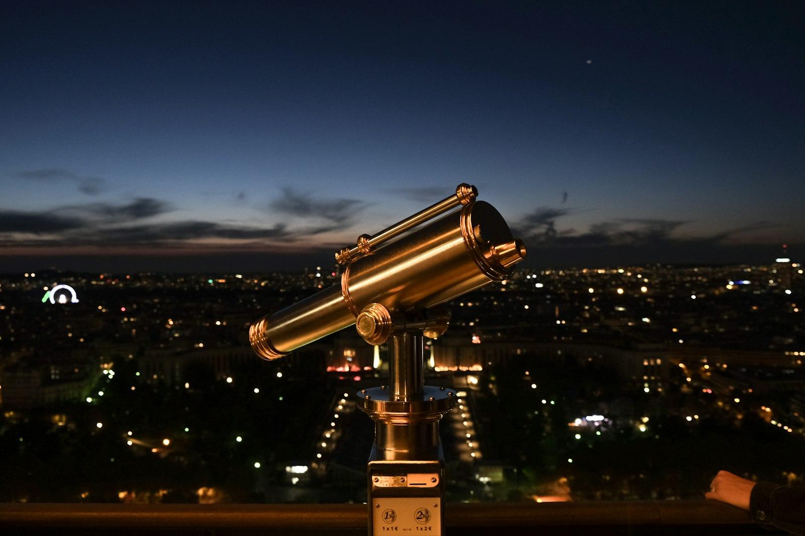 A Telescope Sitting On Top Of A Metal Pole jigsaw puzzle preview
