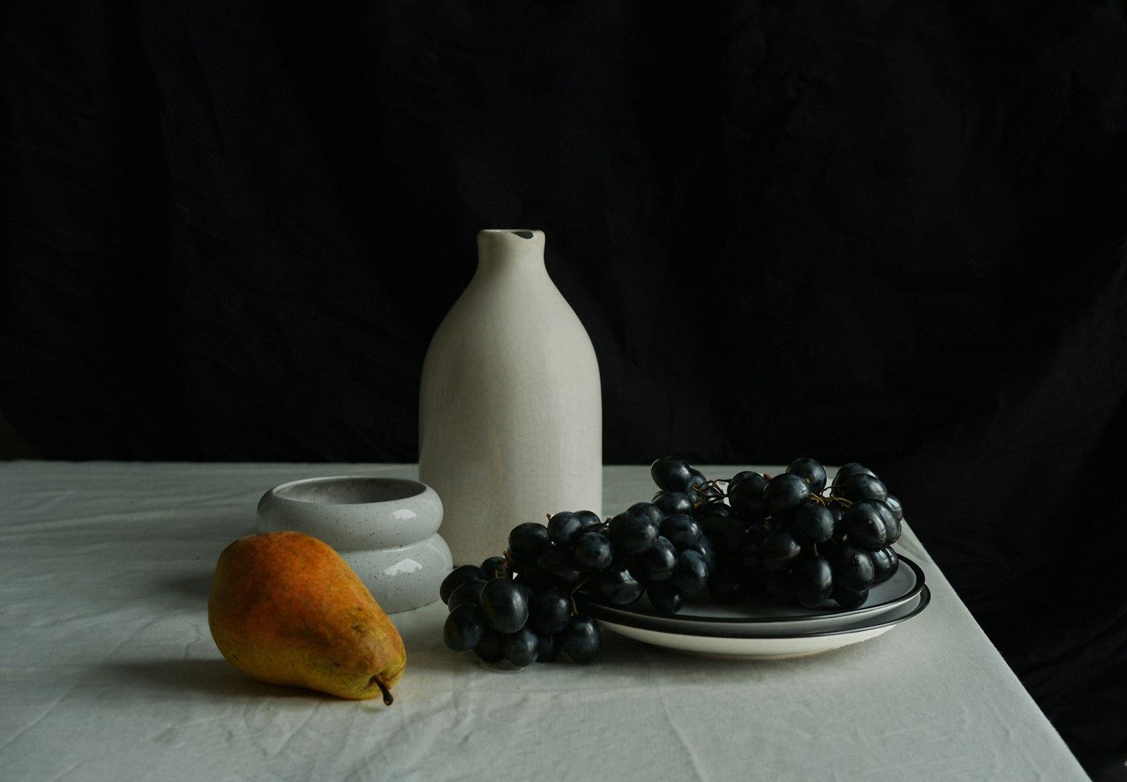 A Vase And Grapes On A Table jigsaw puzzle preview