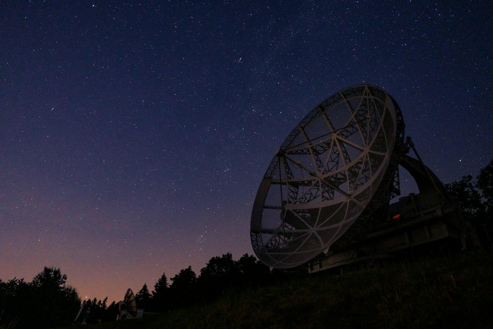 A Very Large Satellite Dish Sitting On Top Of A Hi jigsaw puzzle preview