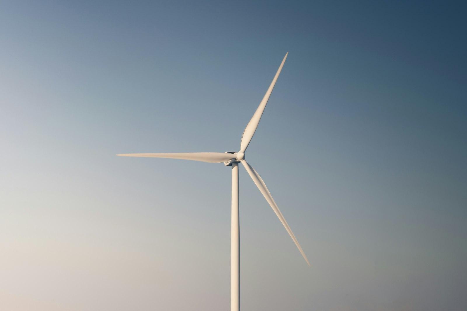A Wind Turbine In The Middle Of A Blue Sky jigsaw puzzle preview