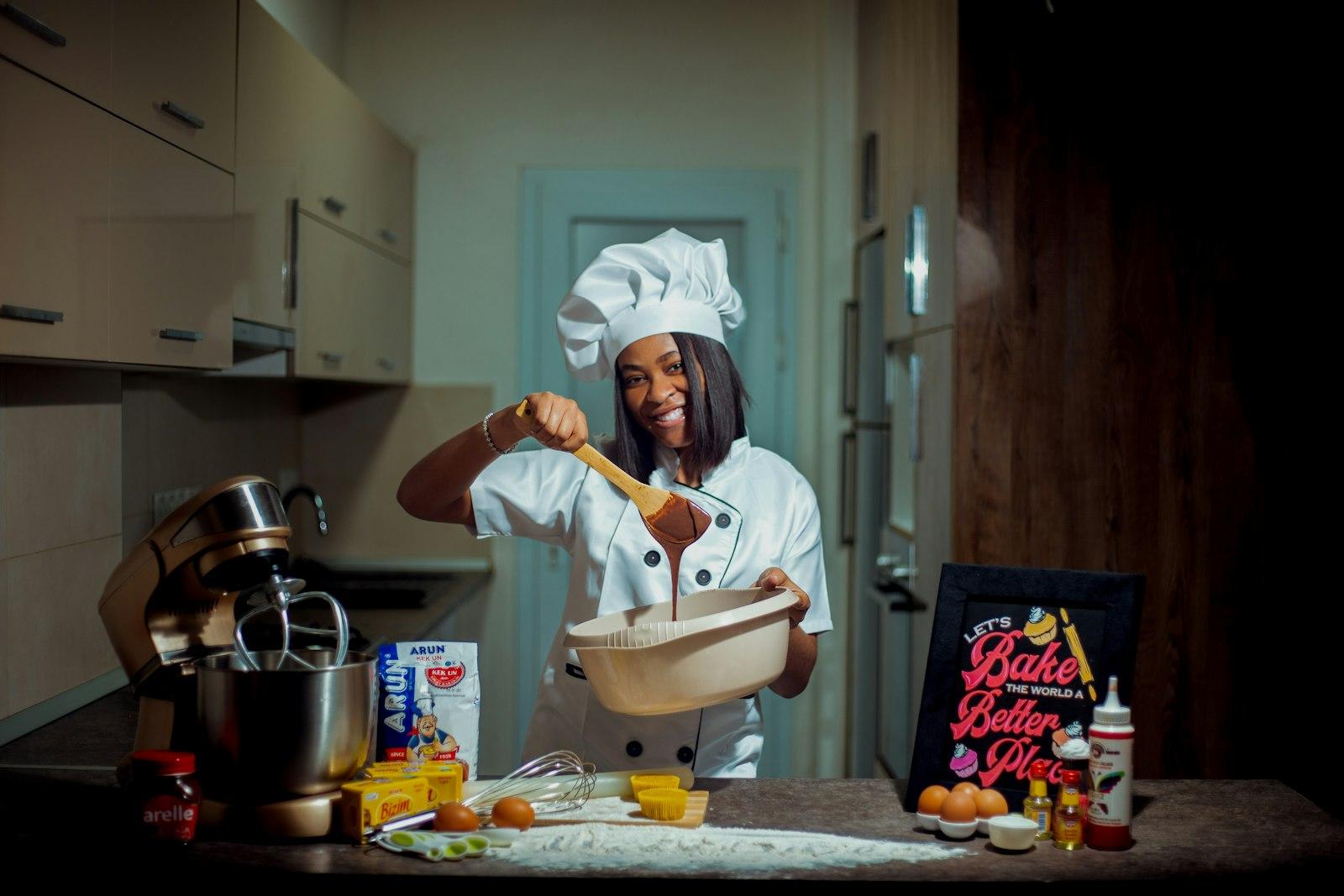 A Woman In A Chef'S Hat Holding A Wooden Spoon jigsaw puzzle preview