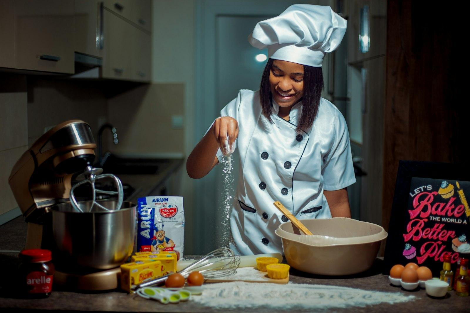 A Woman In A Chef'S Outfit Is Making Food jigsaw puzzle preview