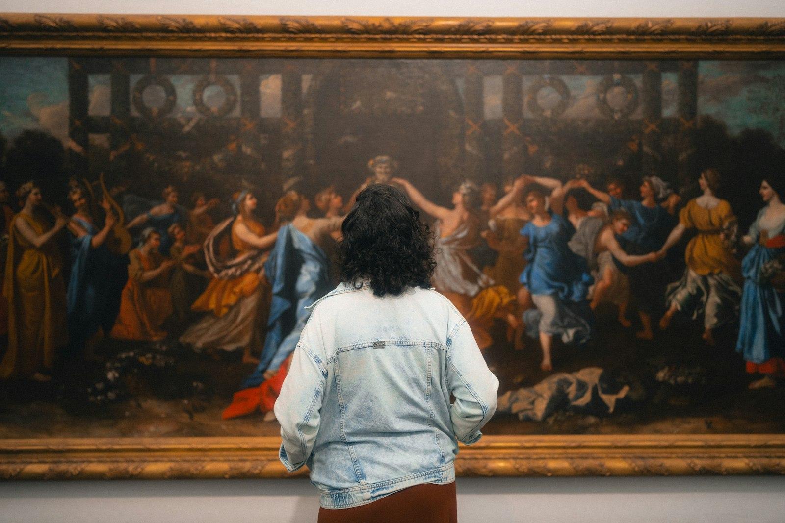 A Woman Looking At A Painting In A Museum jigsaw puzzle preview