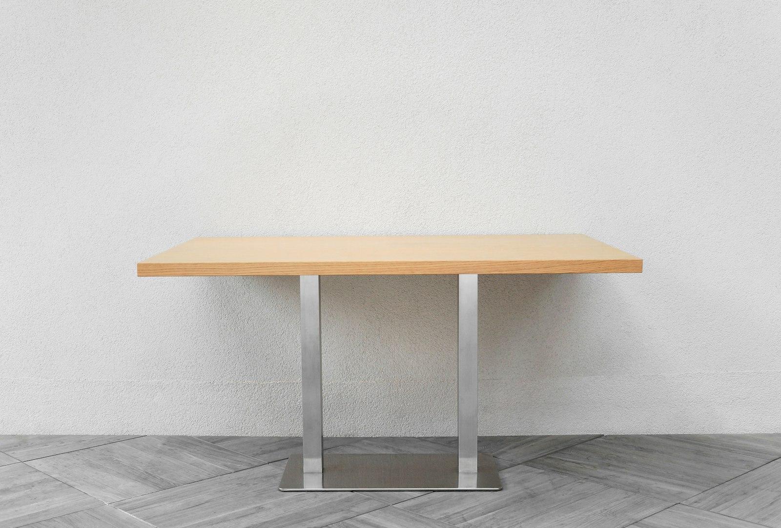 A Wooden Table Sitting On Top Of A Tiled Floor jigsaw puzzle preview