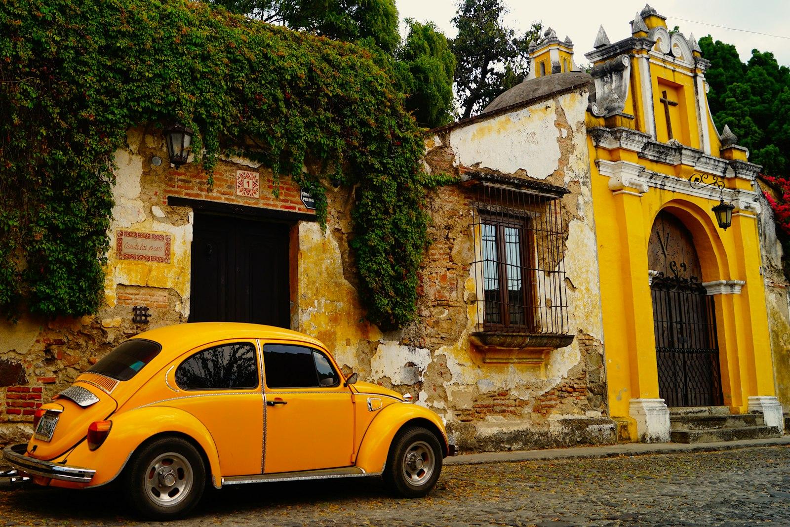 A Yellow Car Parked In Front Of A Building jigsaw puzzle preview