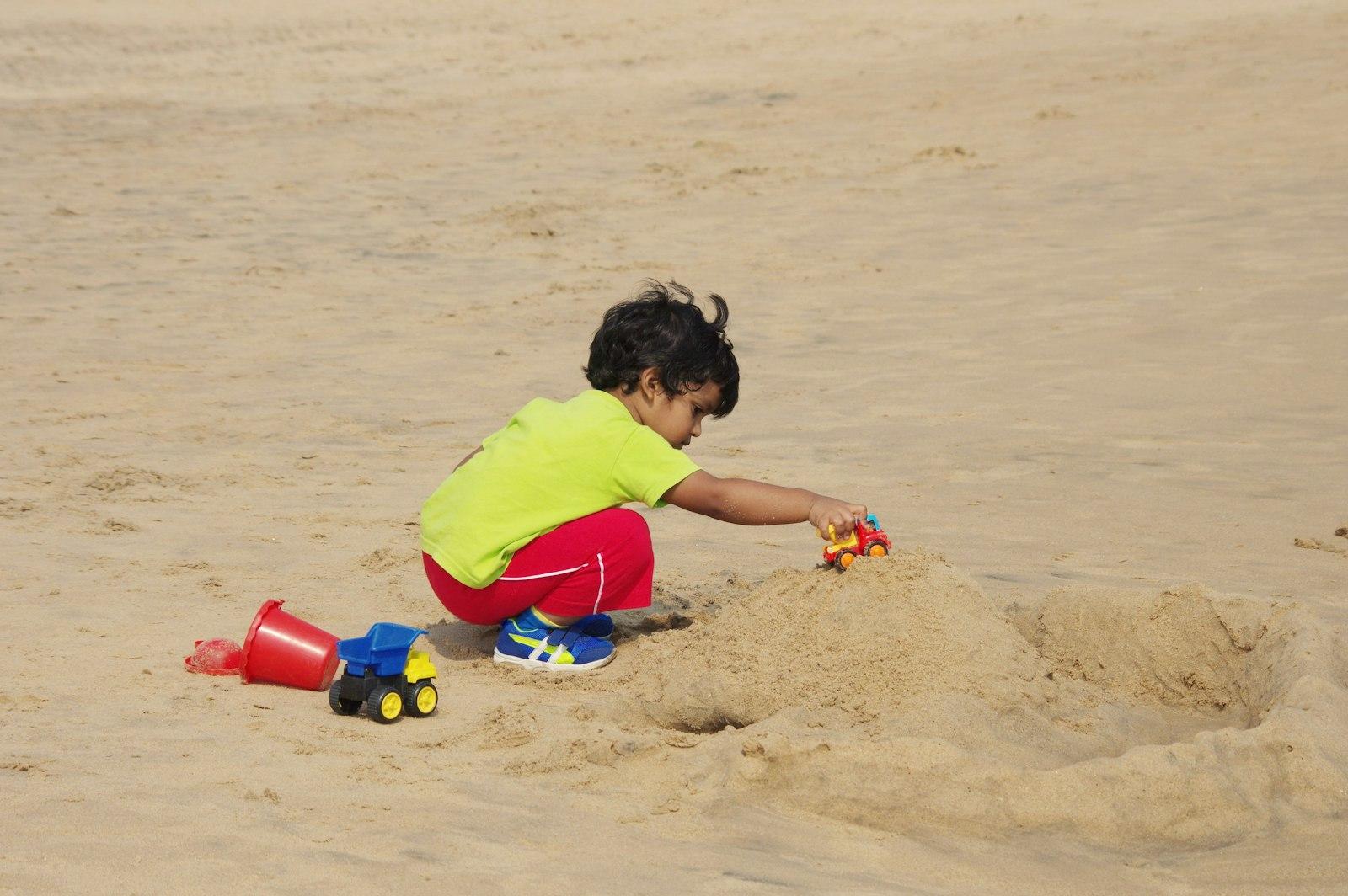 A Young Child Playing On A Beach In Vishakapatnam jigsaw puzzle preview
