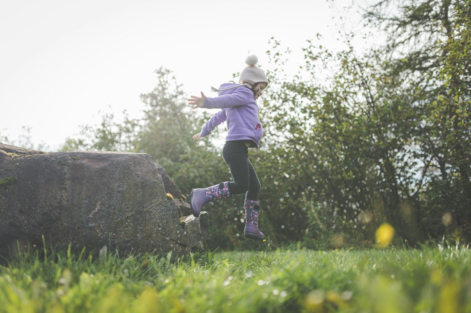 A Young Girl Is Running In The Grass jigsaw puzzle preview