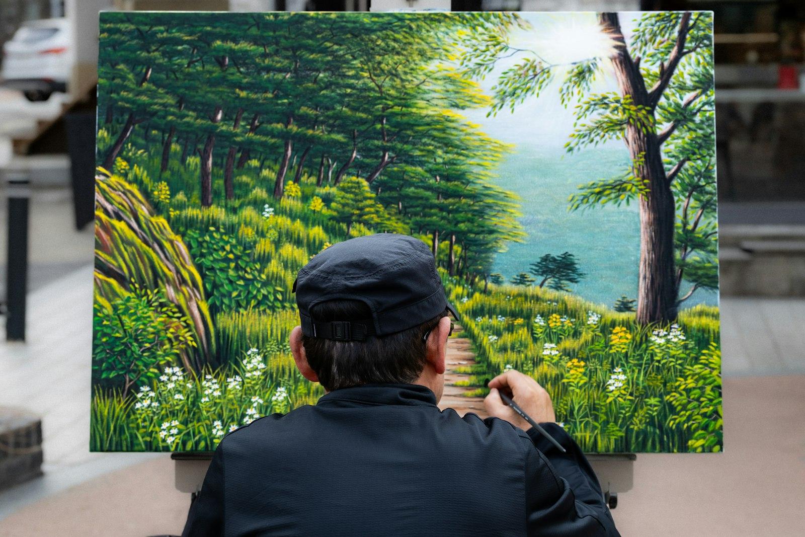 An Artist Paints A Beautiful Forest Landscape jigsaw puzzle preview