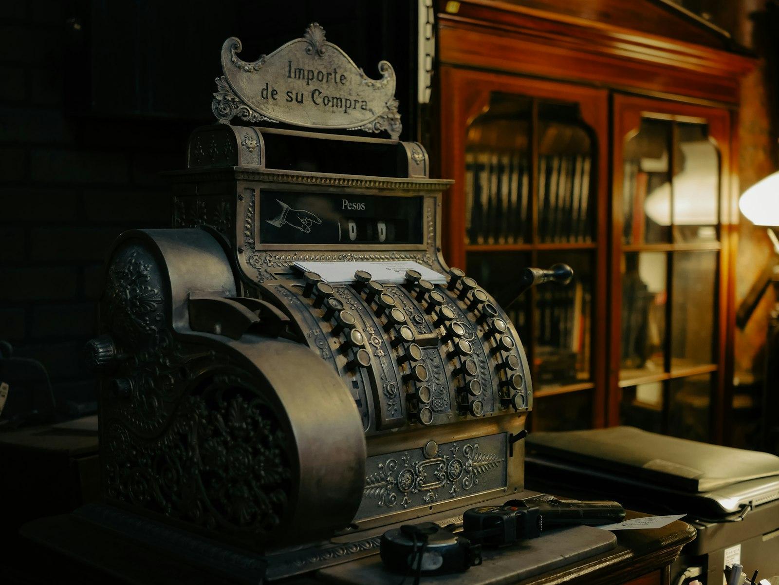 Antique Cash Register With Ornate Details On Displ jigsaw puzzle preview