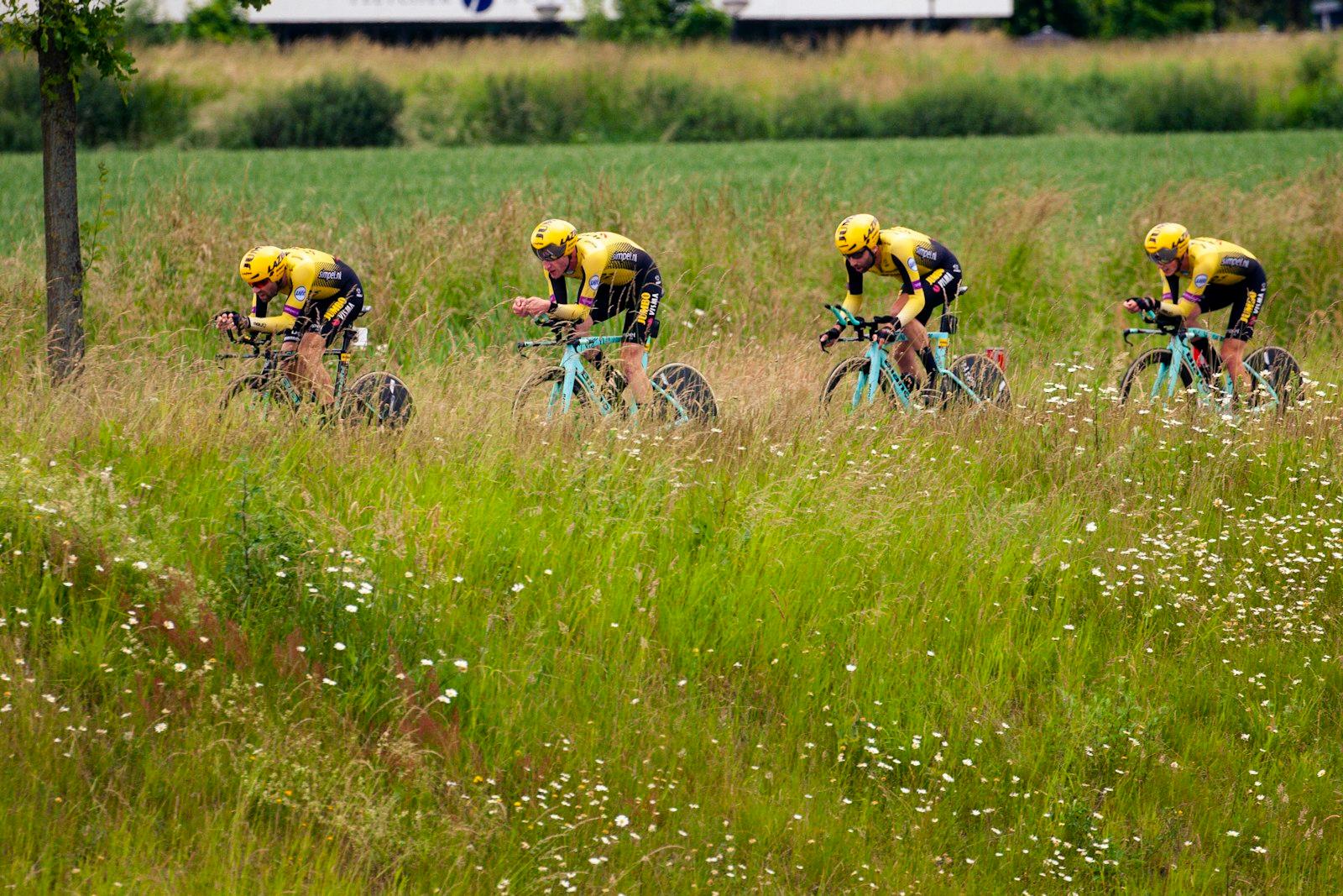Bicycle Racing On Green Grass Field During Daytime jigsaw puzzle preview