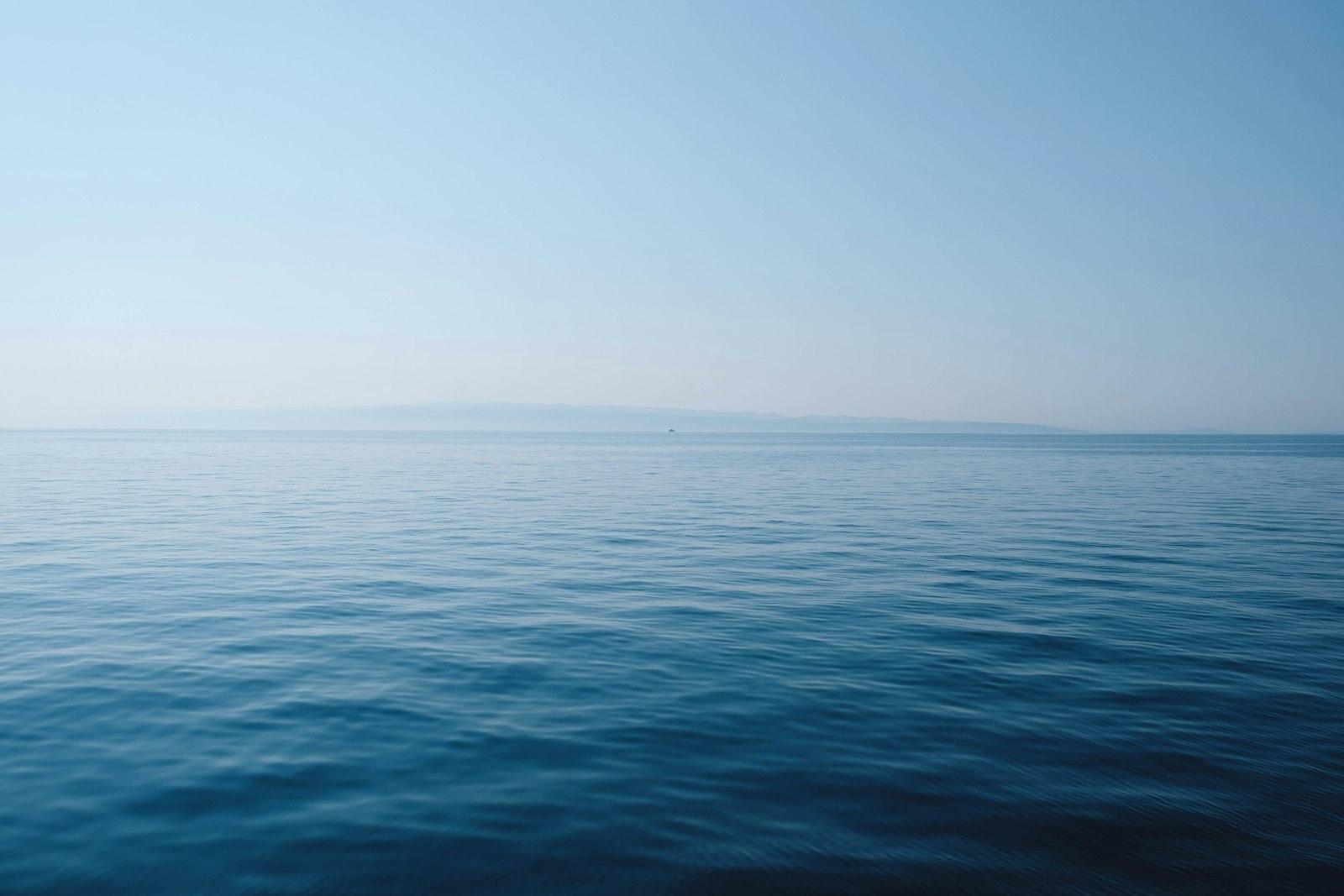 Body Of Water Under Blue And White Sky jigsaw puzzle preview