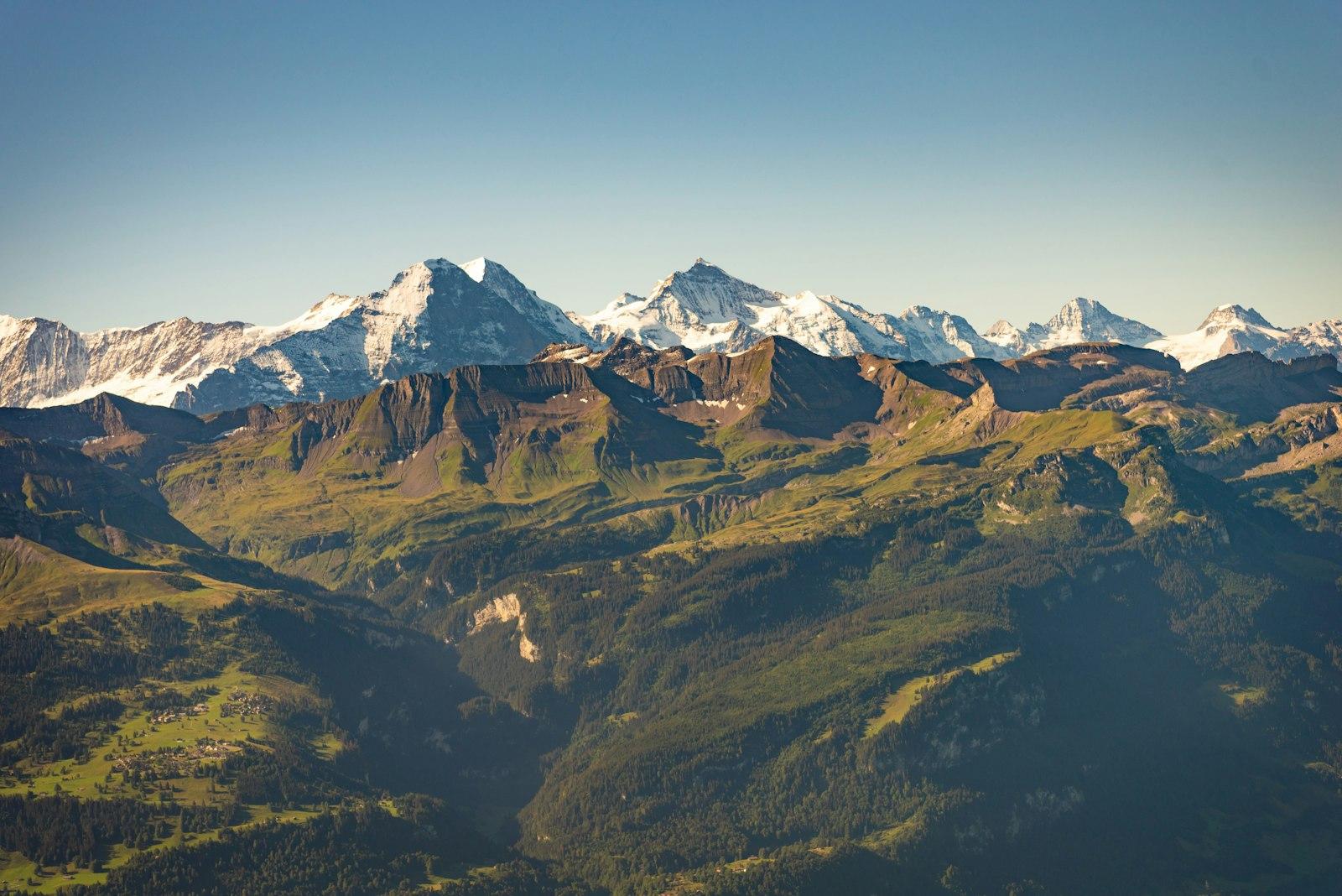 Brown And White Mountains Under Blue Sky jigsaw puzzle preview