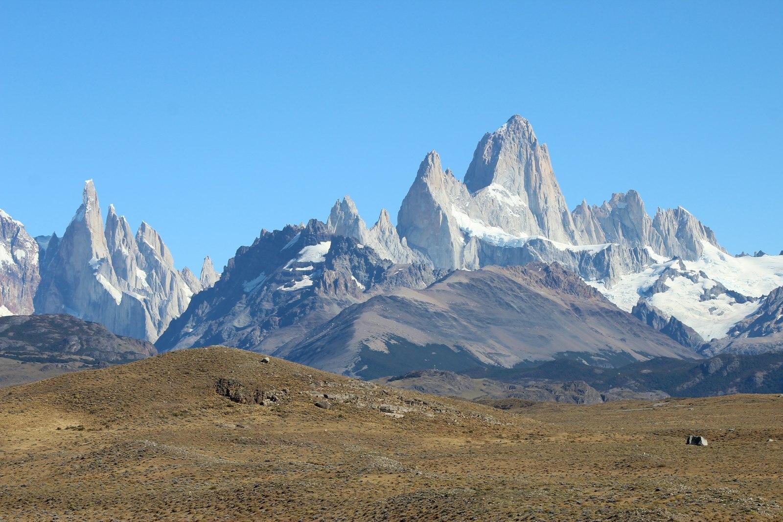Brown And White Mountains Under Blue Sky jigsaw puzzle preview