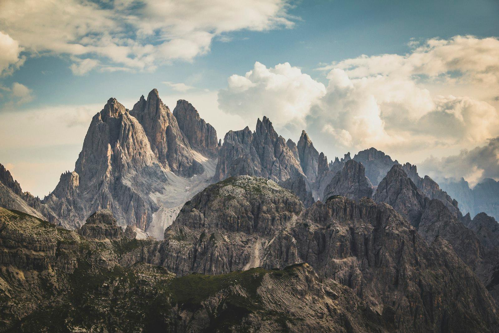 Brown Rocky Mountain Under White Clouds jigsaw puzzle preview