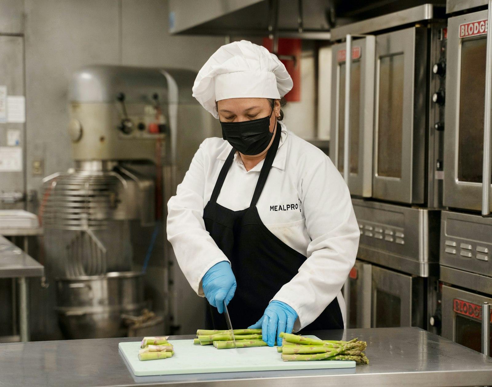Chef Holding Green And Yellow Plastic Tray jigsaw puzzle preview