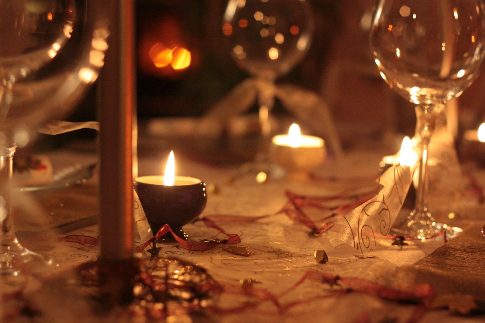 Christmas Table Closeup With Candles And Glasses jigsaw puzzle preview