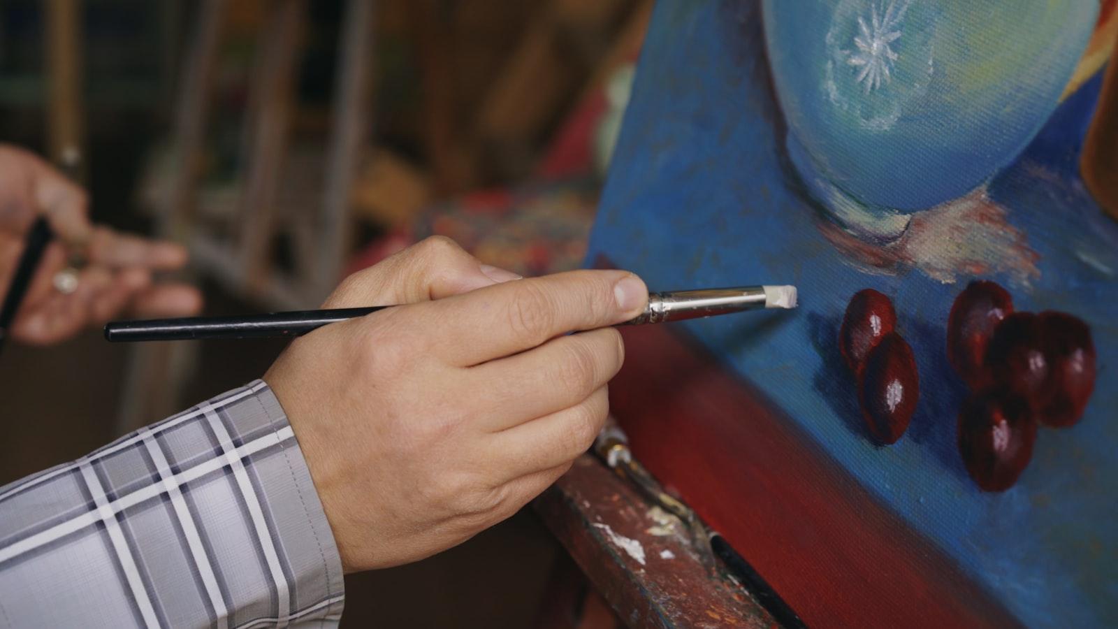 Close Up Of Man'S Hand Painting Still Life Picture jigsaw puzzle preview
