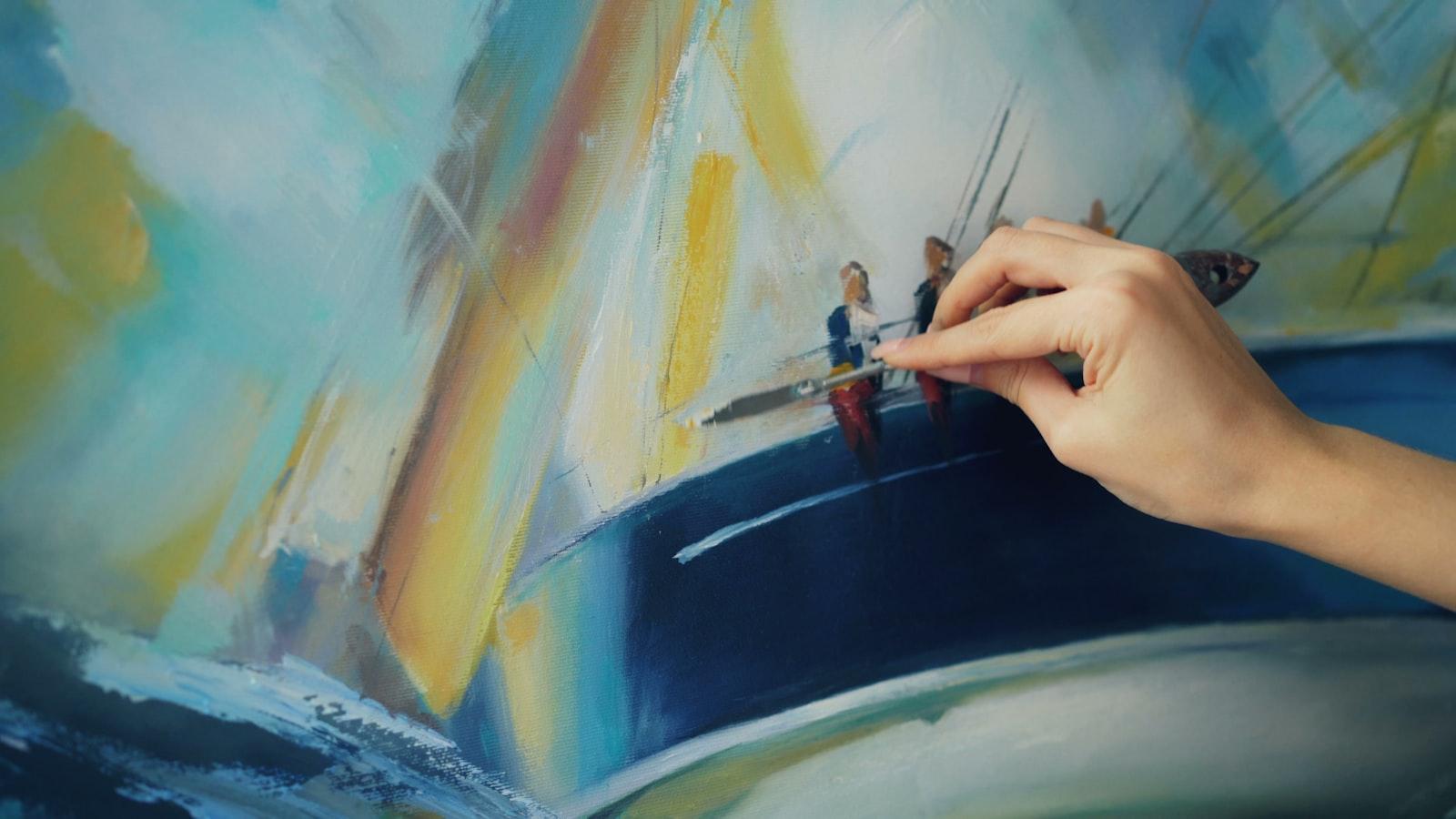 Close-Up Shot Of Female Artist'S Hand Holding Pale jigsaw puzzle preview