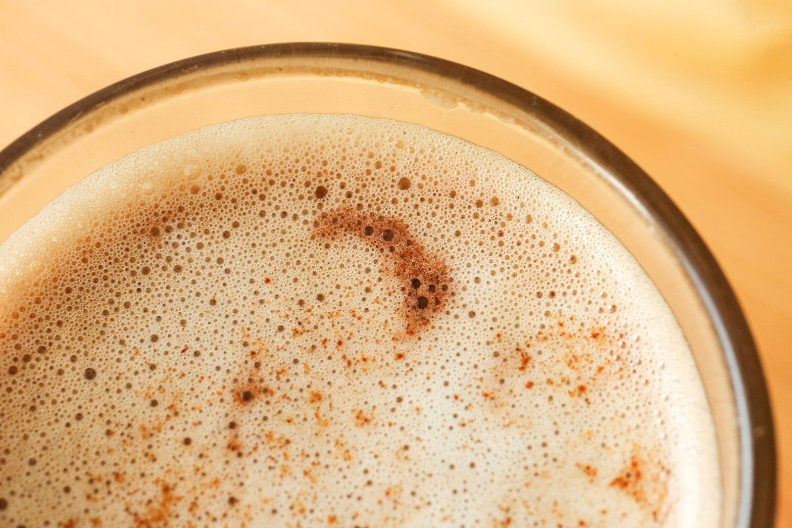 Frothy Drink Is Seen Up Close In A Glass jigsaw puzzle preview