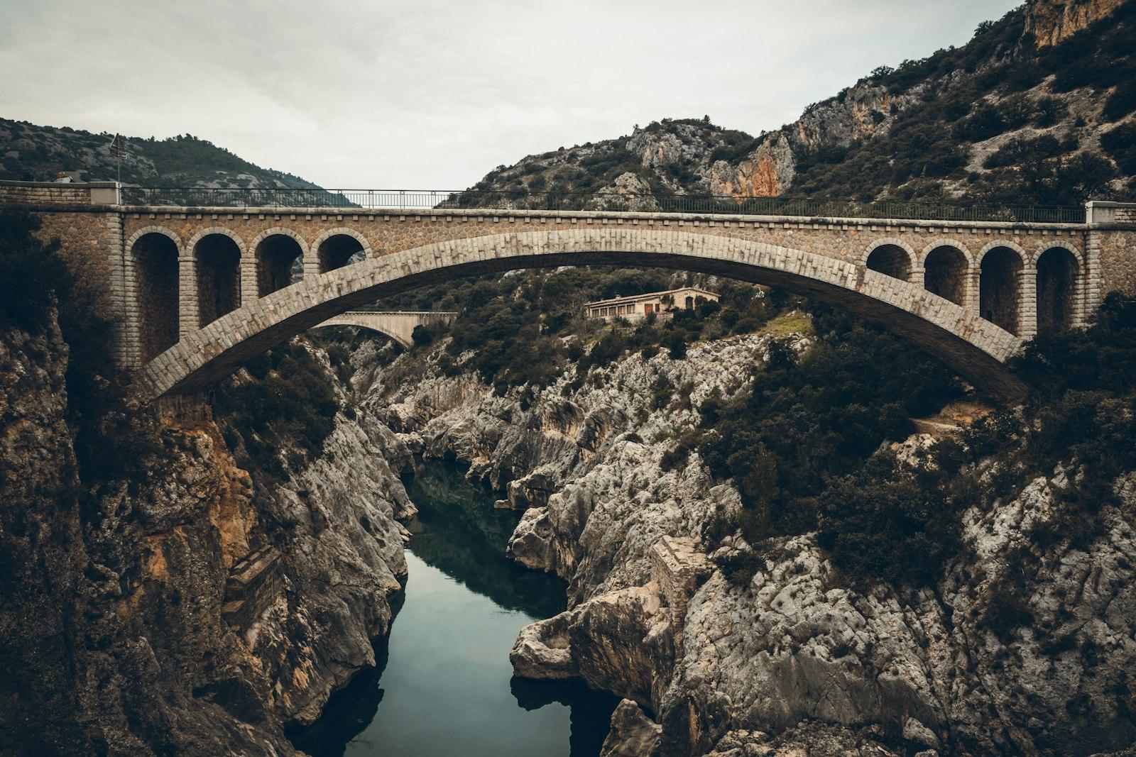 Gray Concrete Bridge Over River jigsaw puzzle preview