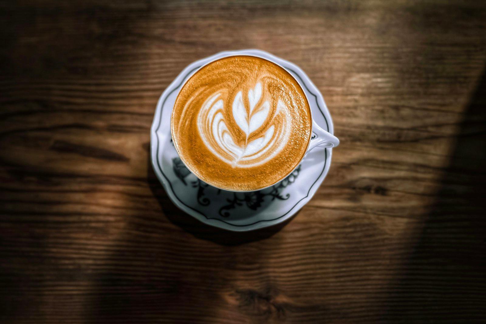 Latte Art Sits On A Rustic Wooden Table jigsaw puzzle preview