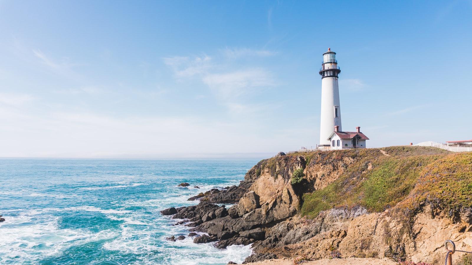 Lighthouse In Mountain Next To Ocean jigsaw puzzle preview