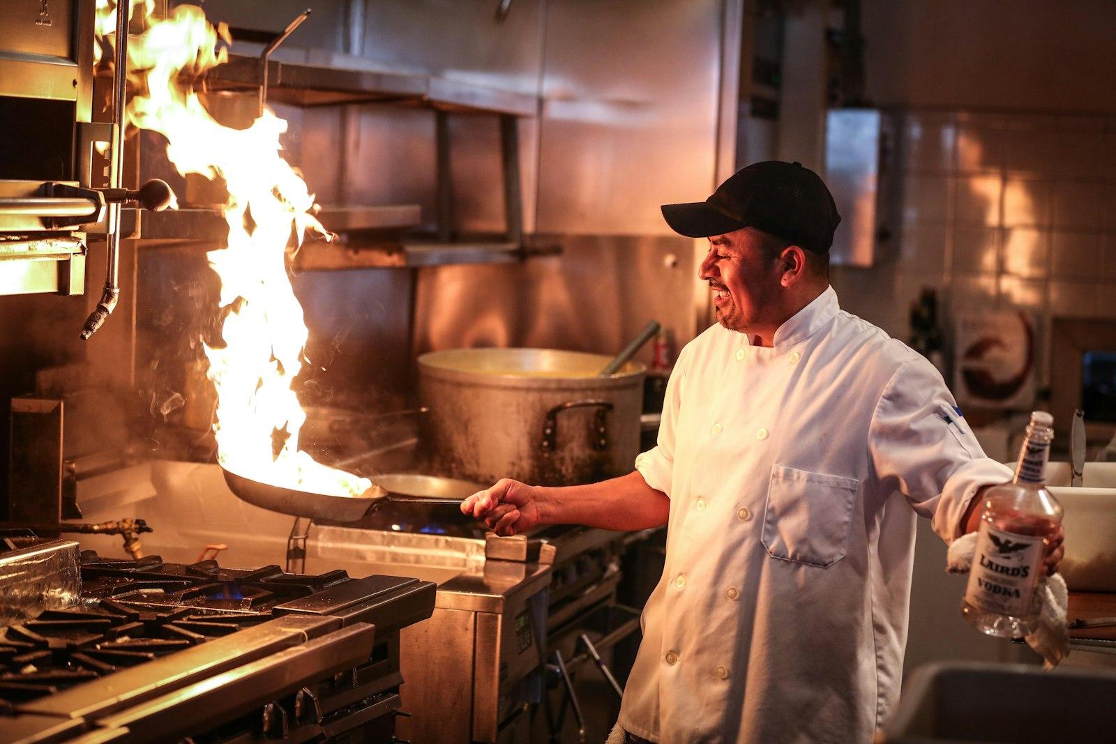 Man In White Chef Uniform Cooking jigsaw puzzle preview