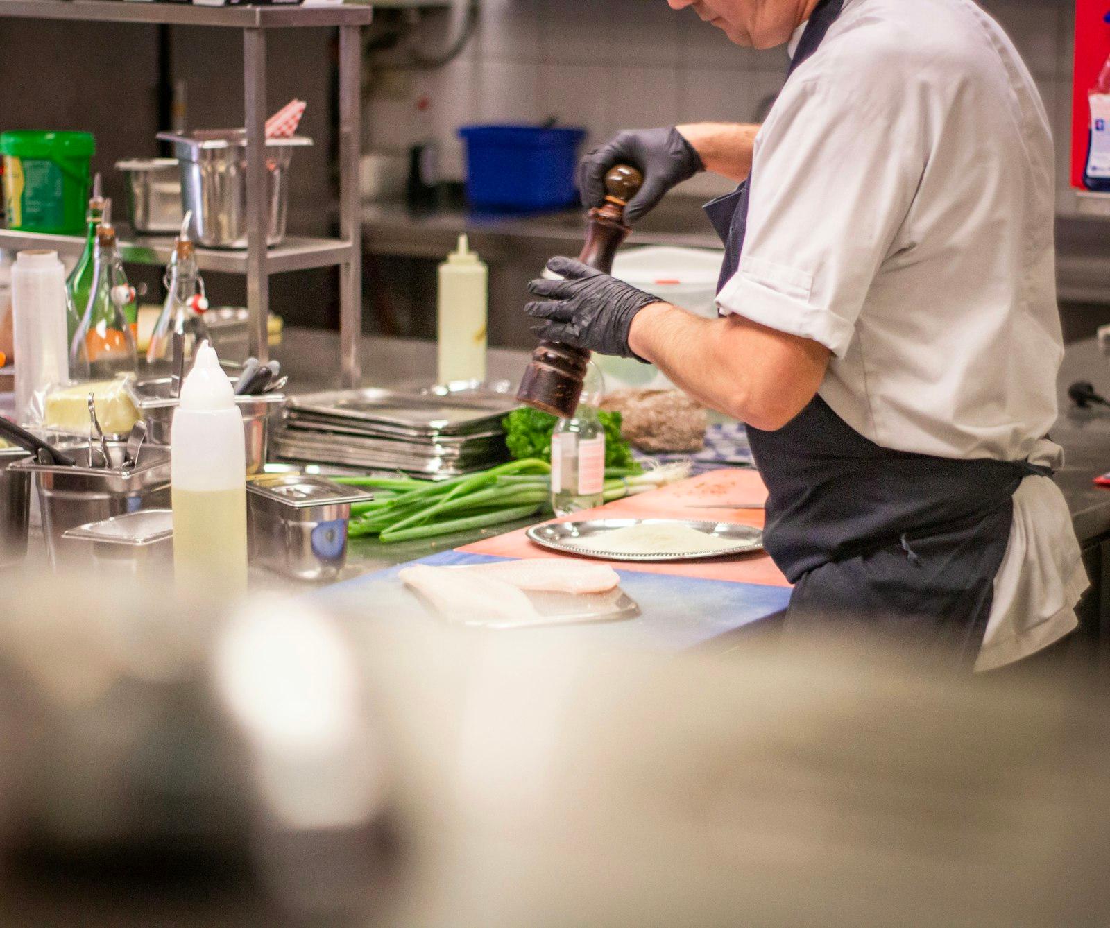 Man Putting Herb On Food jigsaw puzzle preview