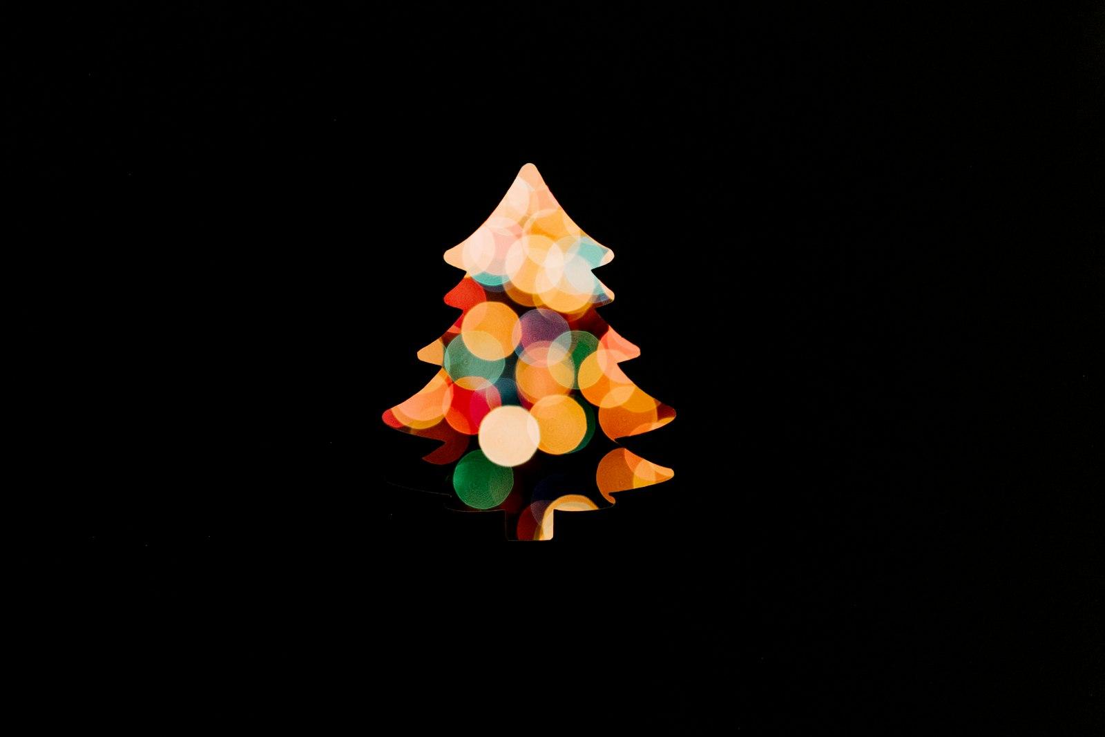 Paper Cutout In Front Of Tree Lights jigsaw puzzle preview