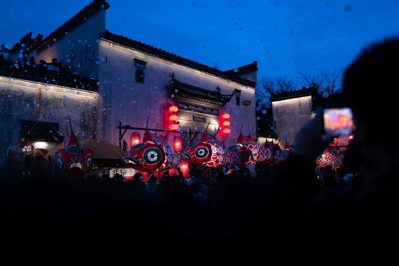 People Filming A Festival With Red Lanterns At Nig jigsaw puzzle preview