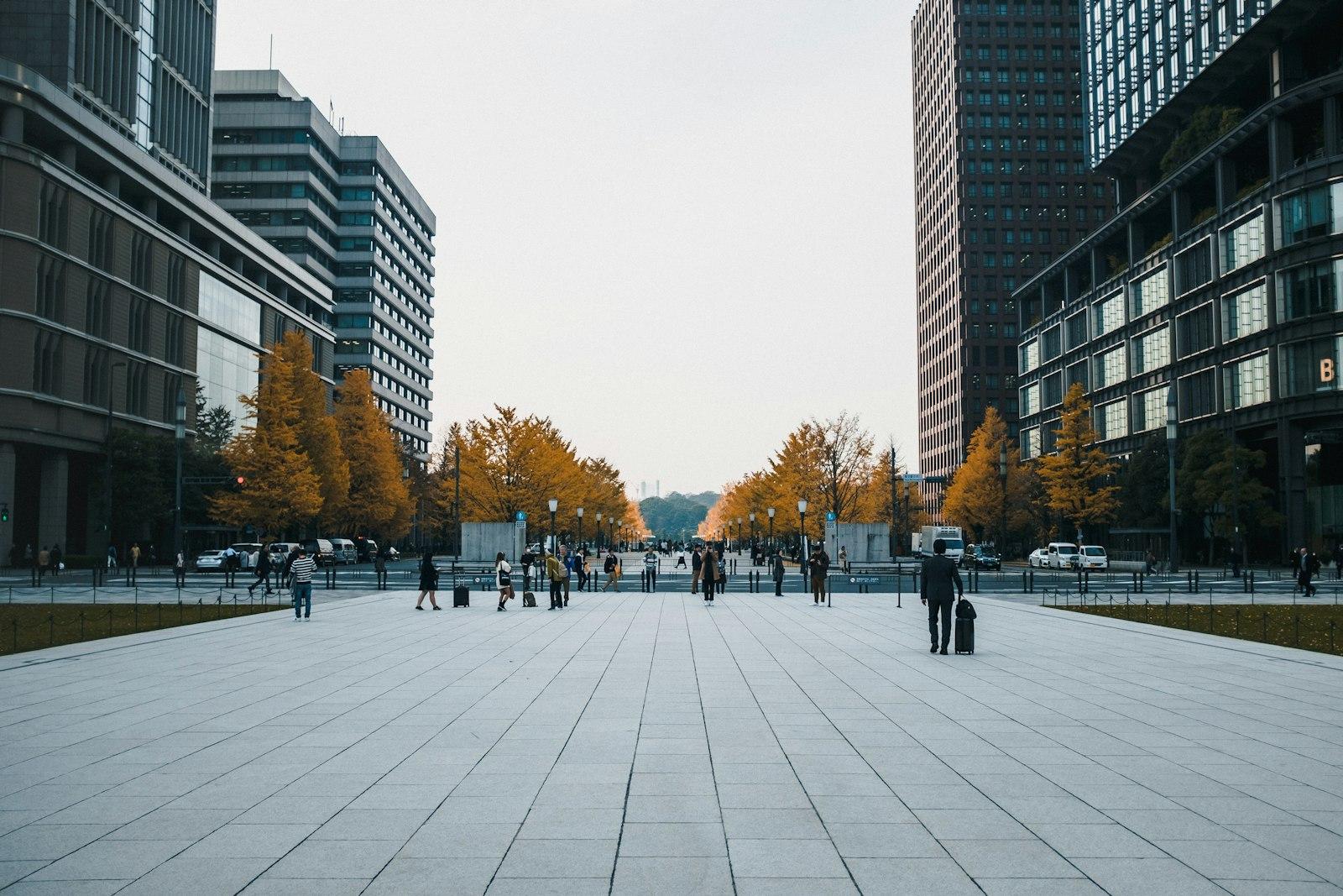 People Walking On Sidewalk Near High Rise Building jigsaw puzzle preview