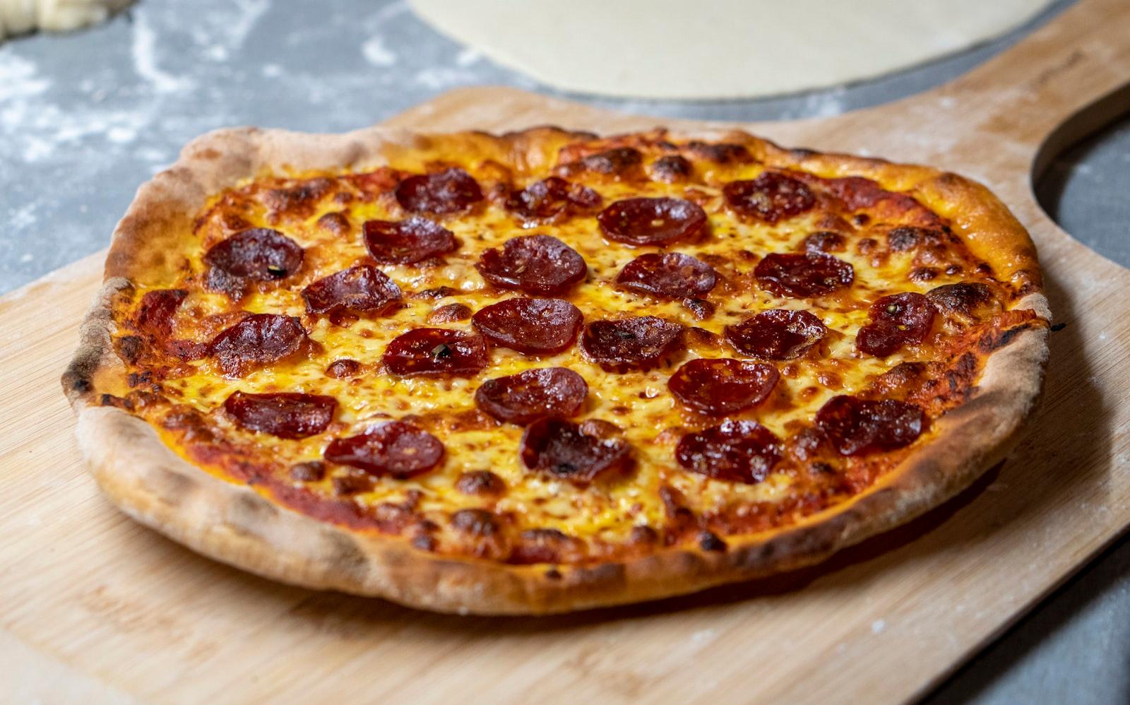 Pepperoni Pizza On A Wooden Tray jigsaw puzzle preview