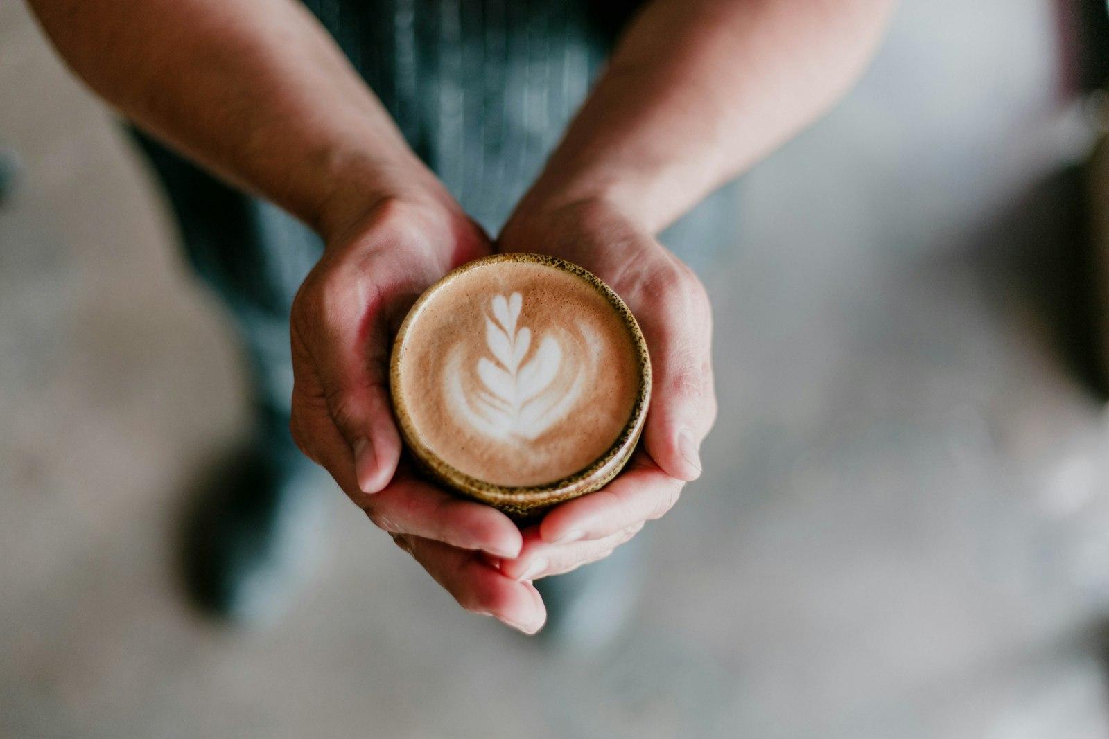 Person Holding Coffee Cup jigsaw puzzle preview
