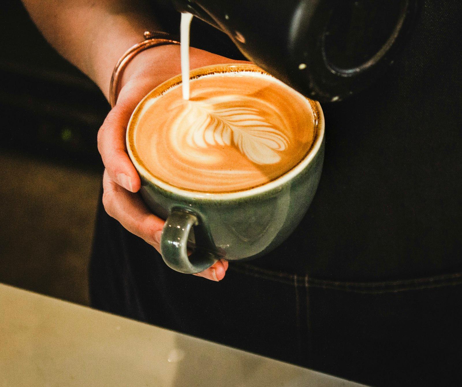 Person Pouring Coffee On Cup jigsaw puzzle preview