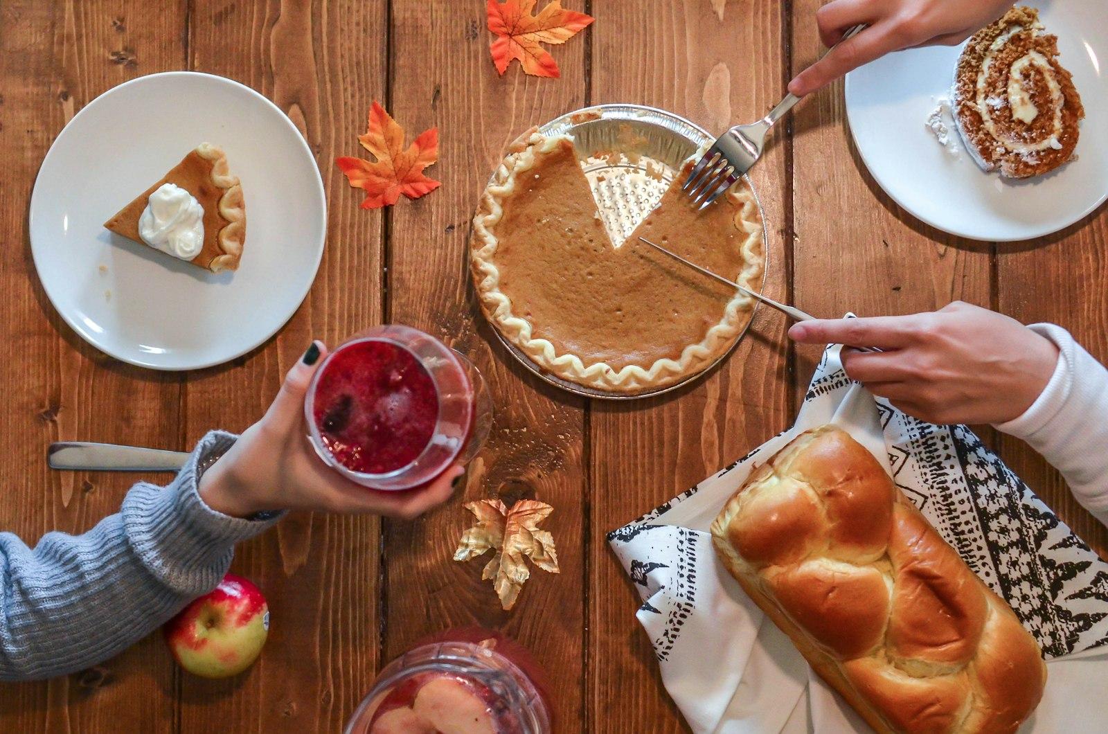 Person Slicing Pie Beside Bread jigsaw puzzle preview